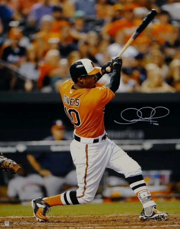 Adam Jones Signed Orioles 16×20 Swinging Vertical Photo- Fanatics Authenticated