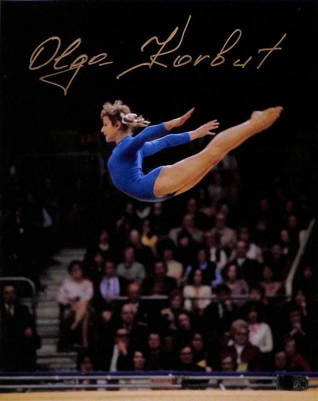 Olga Korbut Signed 8×10 Flying (AIV)